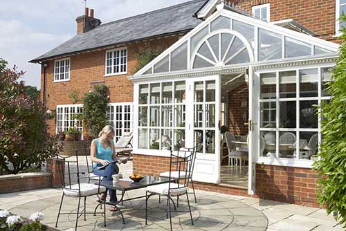 Consider building a conservatory to enjoy your garden all year round